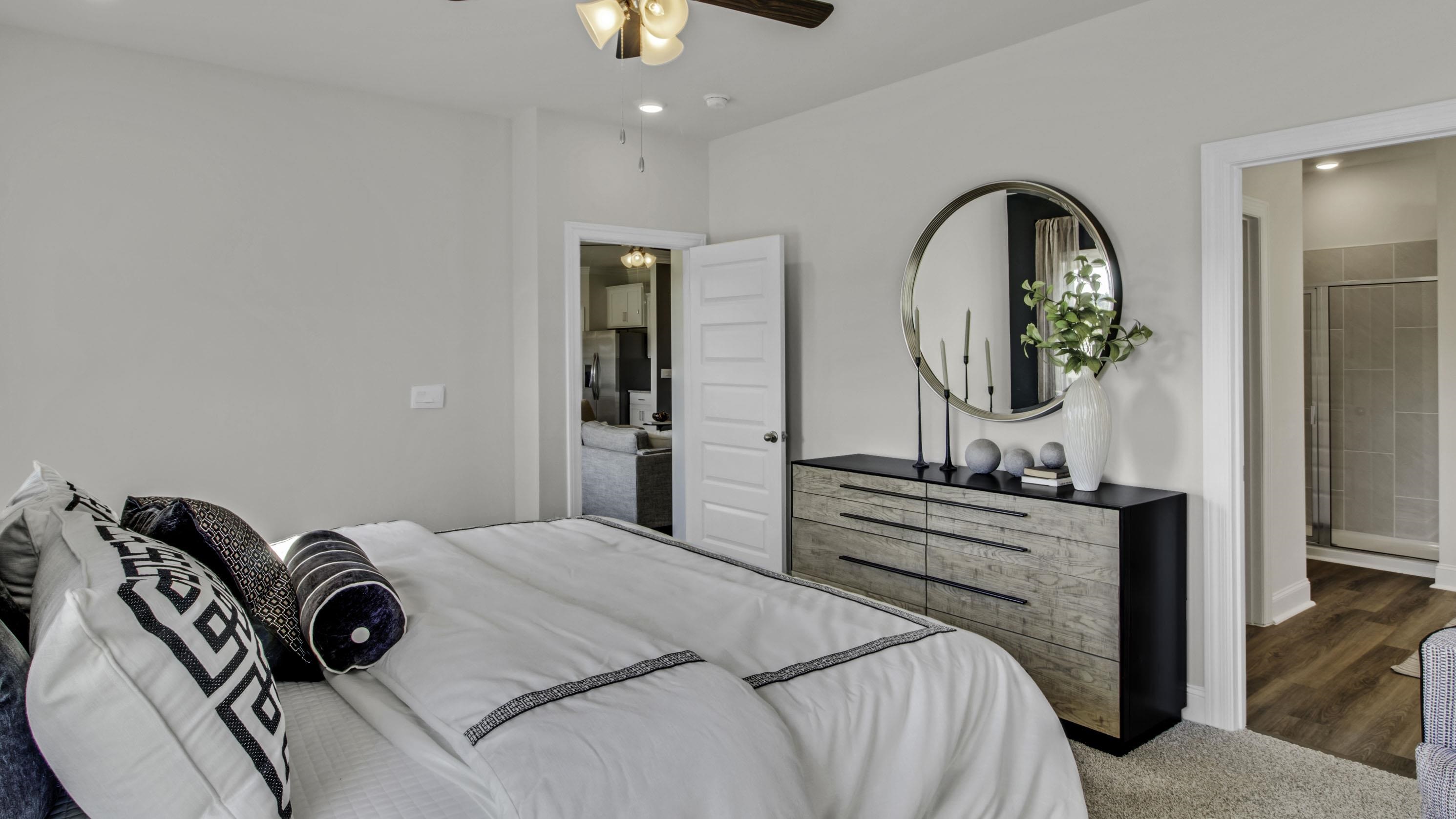 1010 Mewborn Farm Road Oakland, TN 38060 - Photo 16 of 40 a bedroom with a bed and a dresser