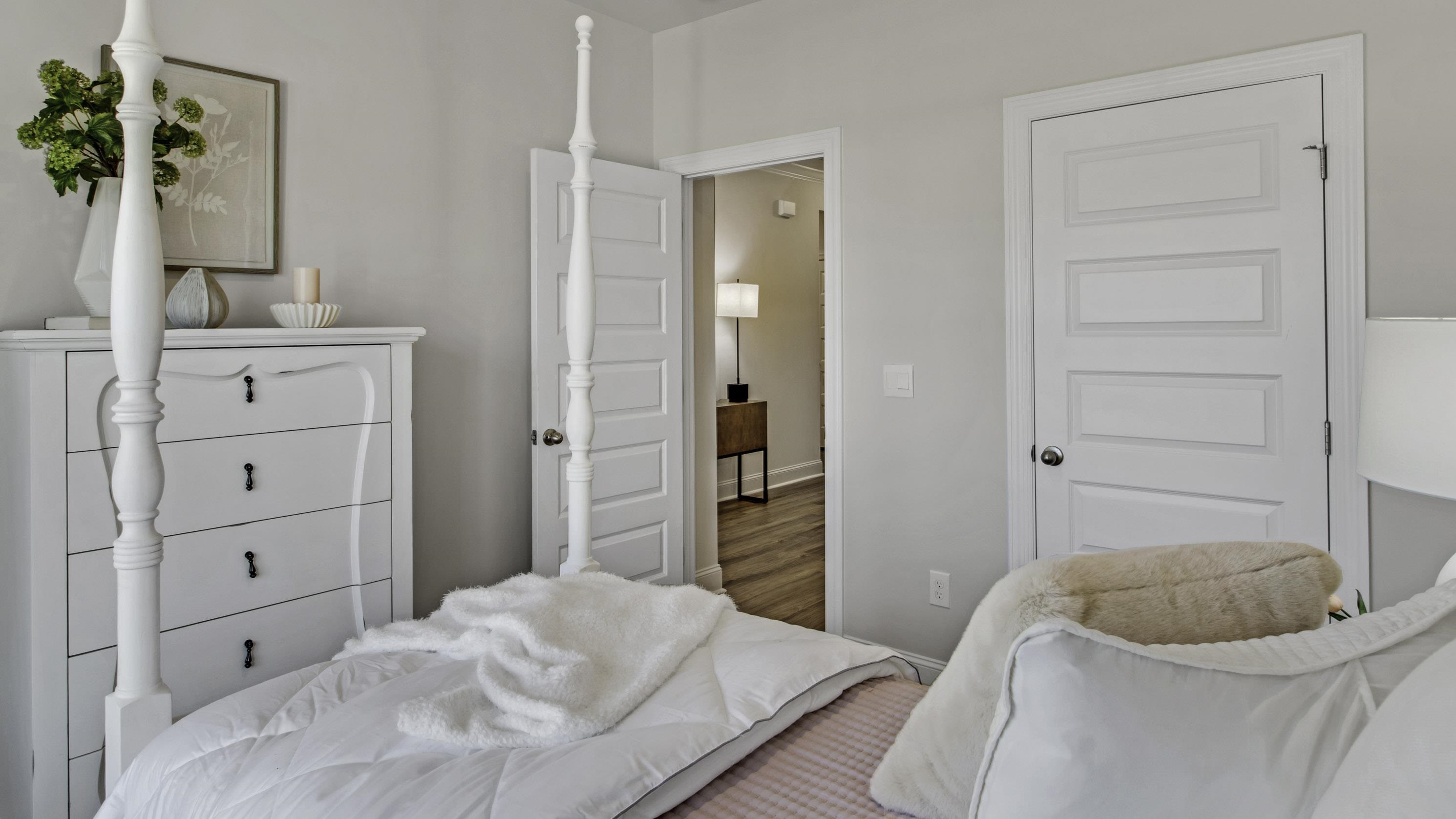 1010 Mewborn Farm Road Oakland, TN 38060 - Photo 22 of 40 a bedroom with a bed and a dresser