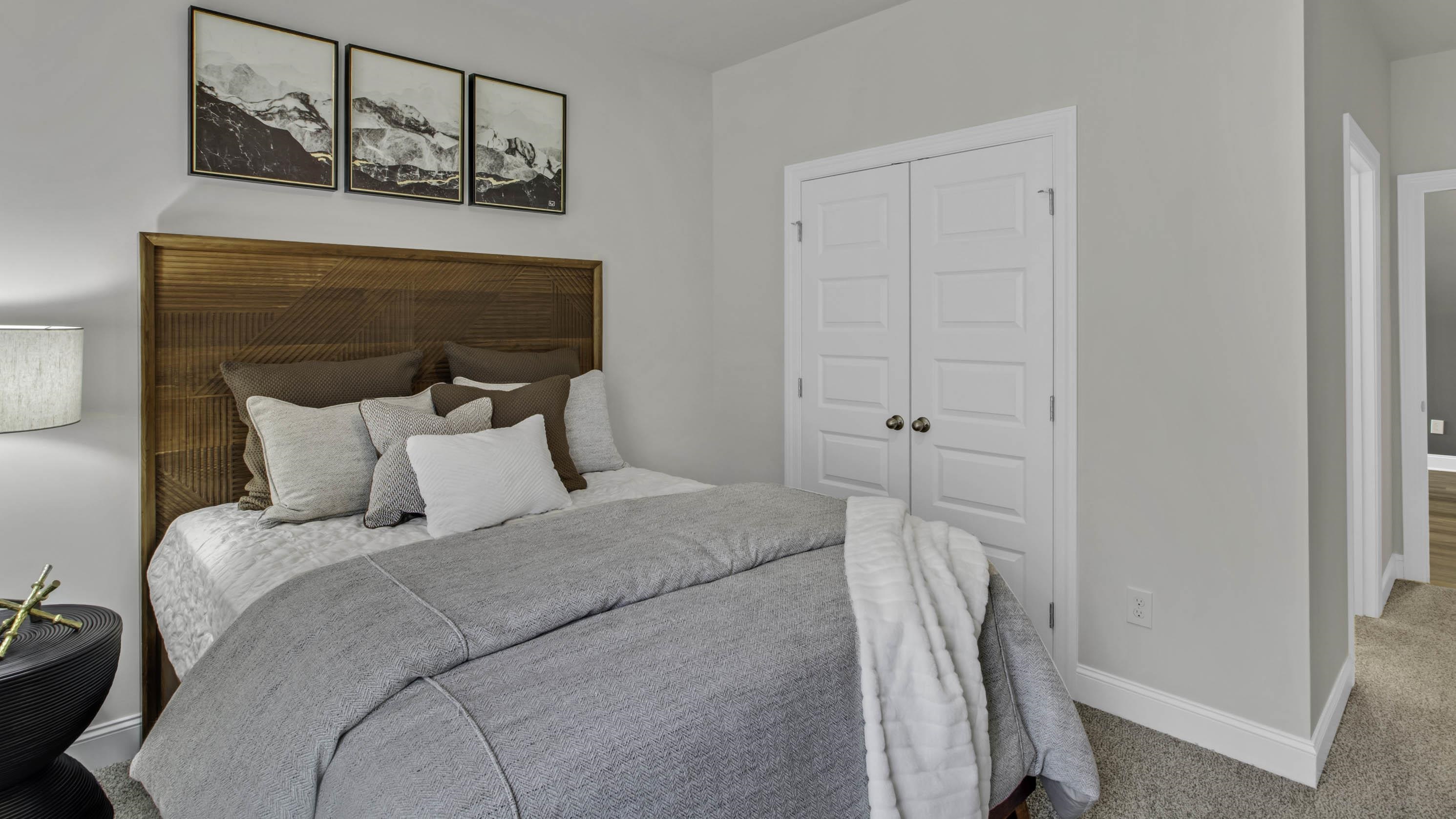 1010 Mewborn Farm Road Oakland, TN 38060 - Photo 30 of 40 a bed room with a bed and a window