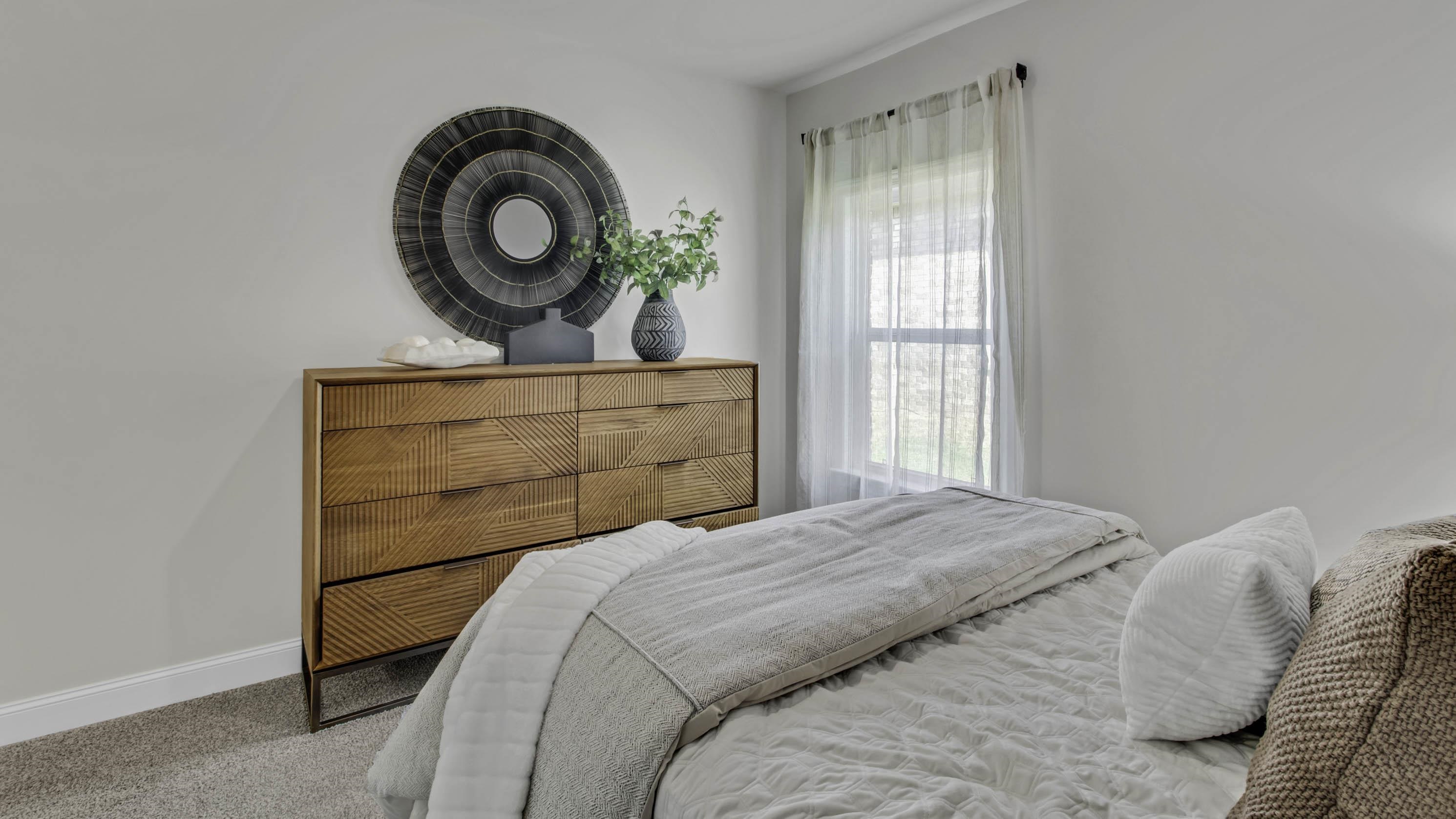 1010 Mewborn Farm Road Oakland, TN 38060 - Photo 31 of 40 a bedroom with a bed and a window