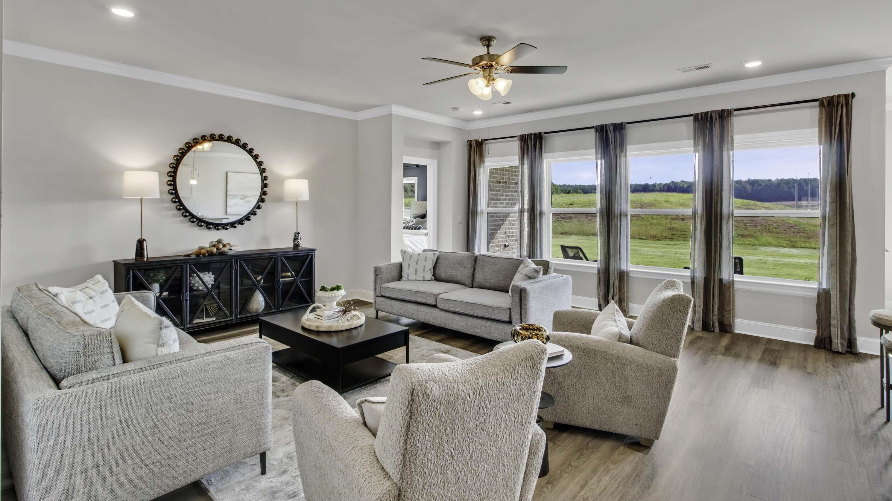 1010 Mewborn Farm Road Oakland, TN 38060 - Photo 7 of 40 a living room with furniture a table and a large window