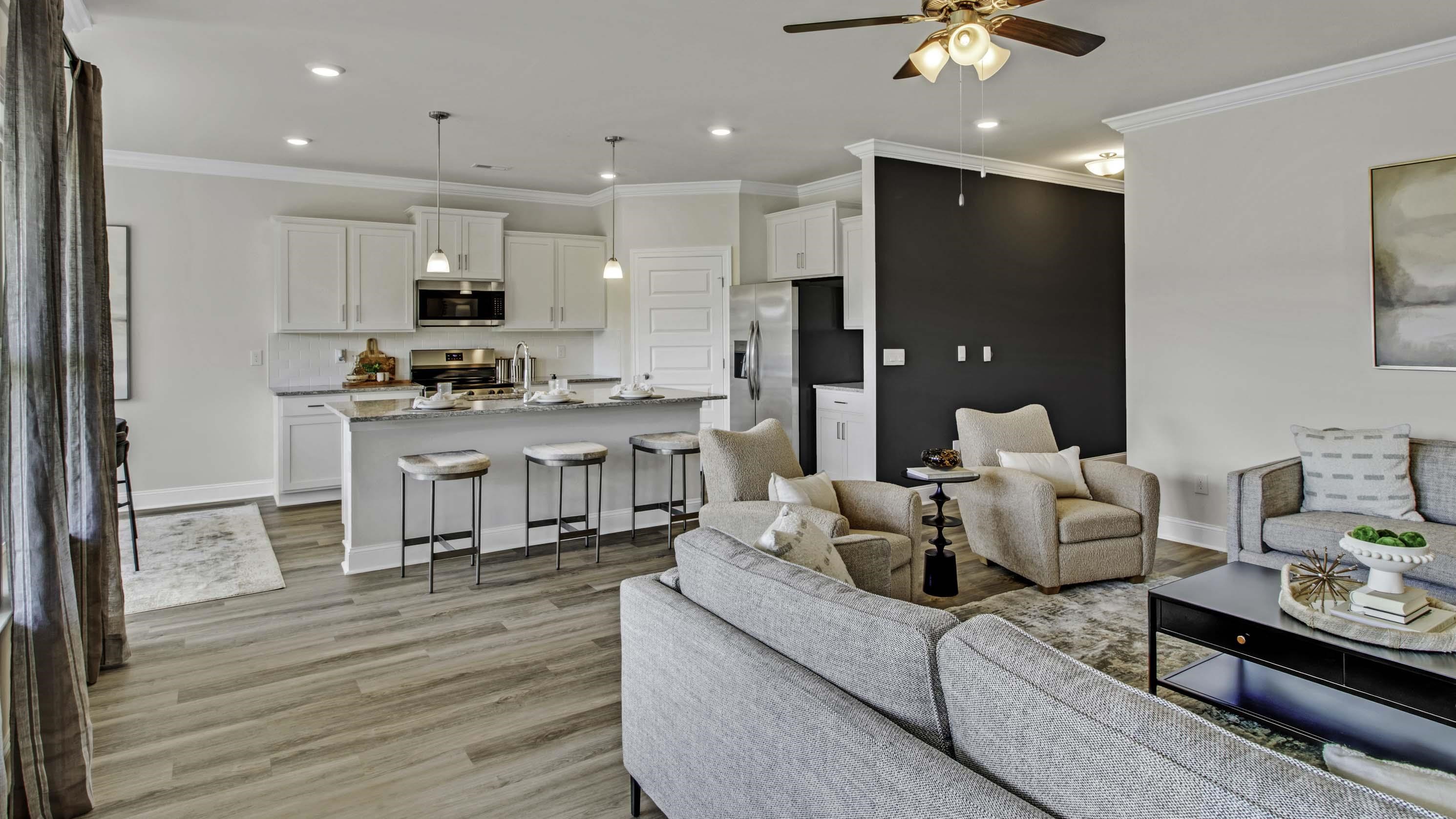 1010 Mewborn Farm Road Oakland, TN 38060 - Photo 10 of 40 a living room with furniture and a kitchen view