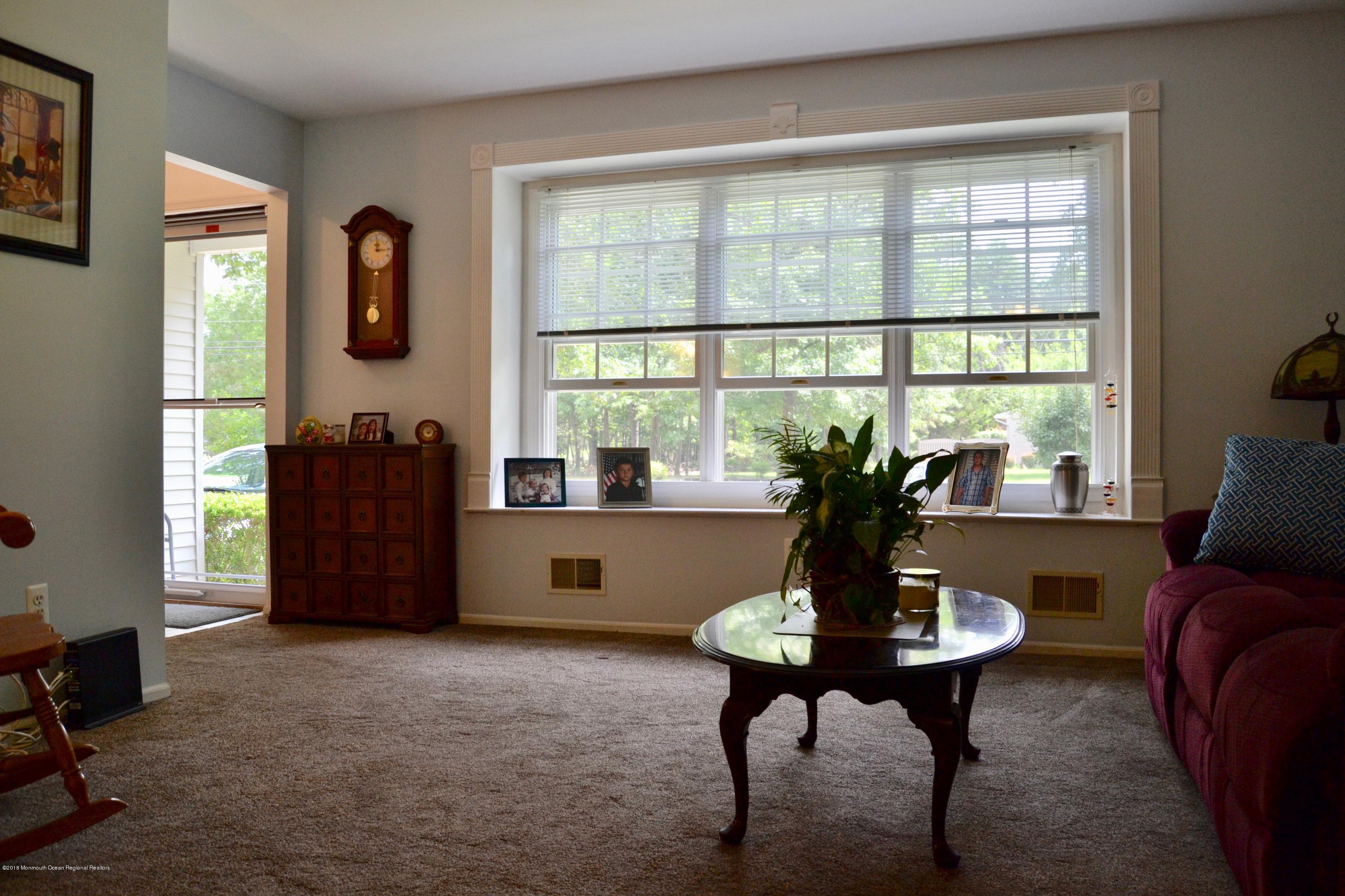3087 Ridgeway Boulevard Manchester Township, NJ 08759 - Photo 12 of 30 a view of a livingroom with furniture and a window