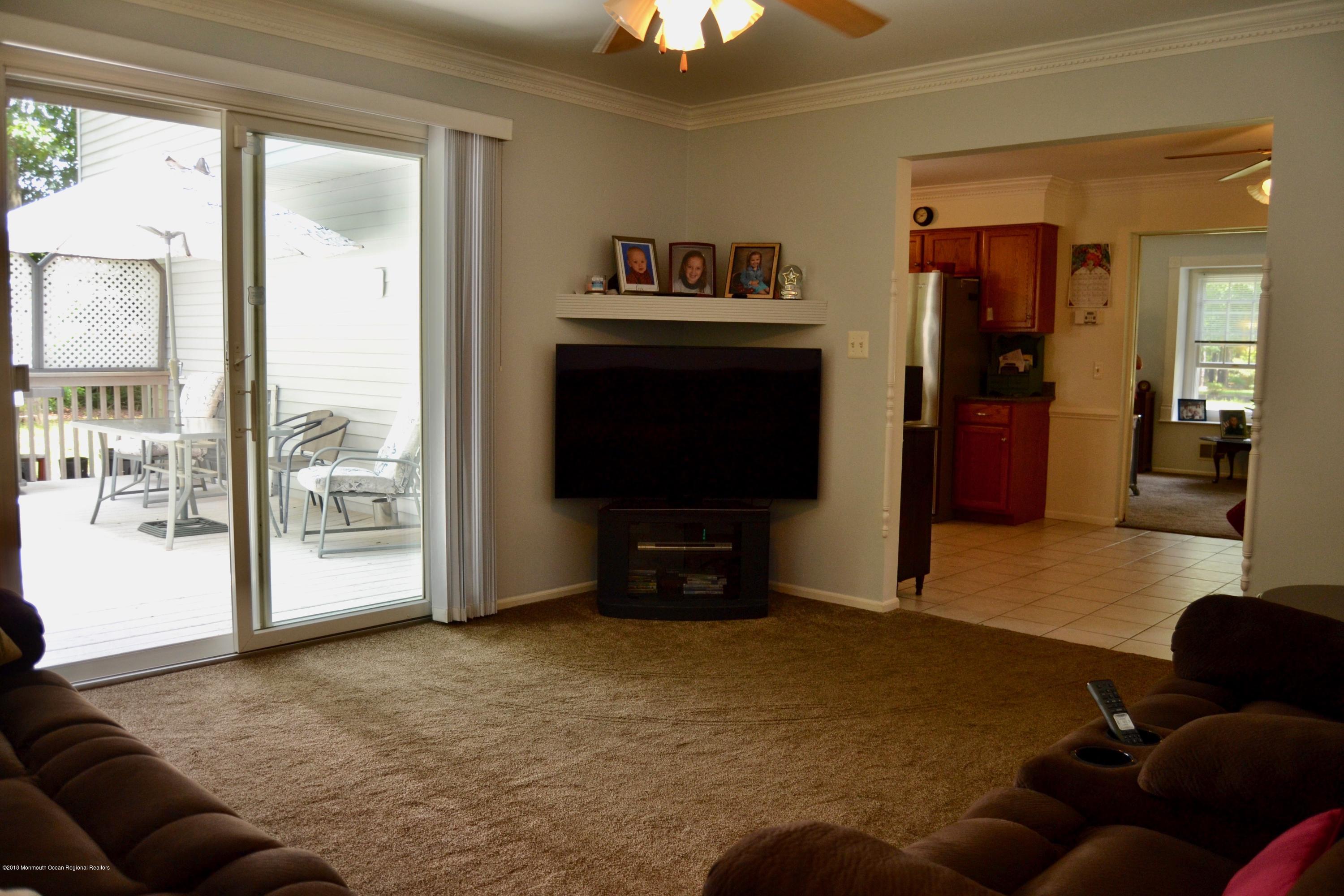 3087 Ridgeway Boulevard Manchester Township, NJ 08759 - Photo 20 of 30 a living room with furniture and a flat screen tv