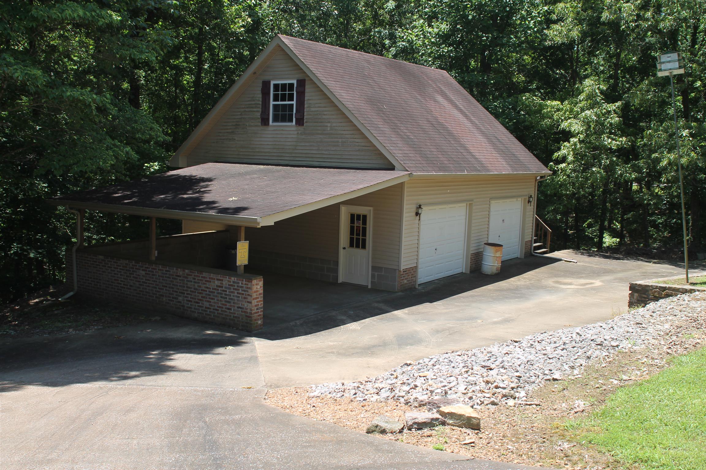 485 Metal Ford Road Hohenwald, TN 38462 - Photo 4 of 20 Detached 2 Car Garage with Carport and Floored, Wired and Insulated Upstairs