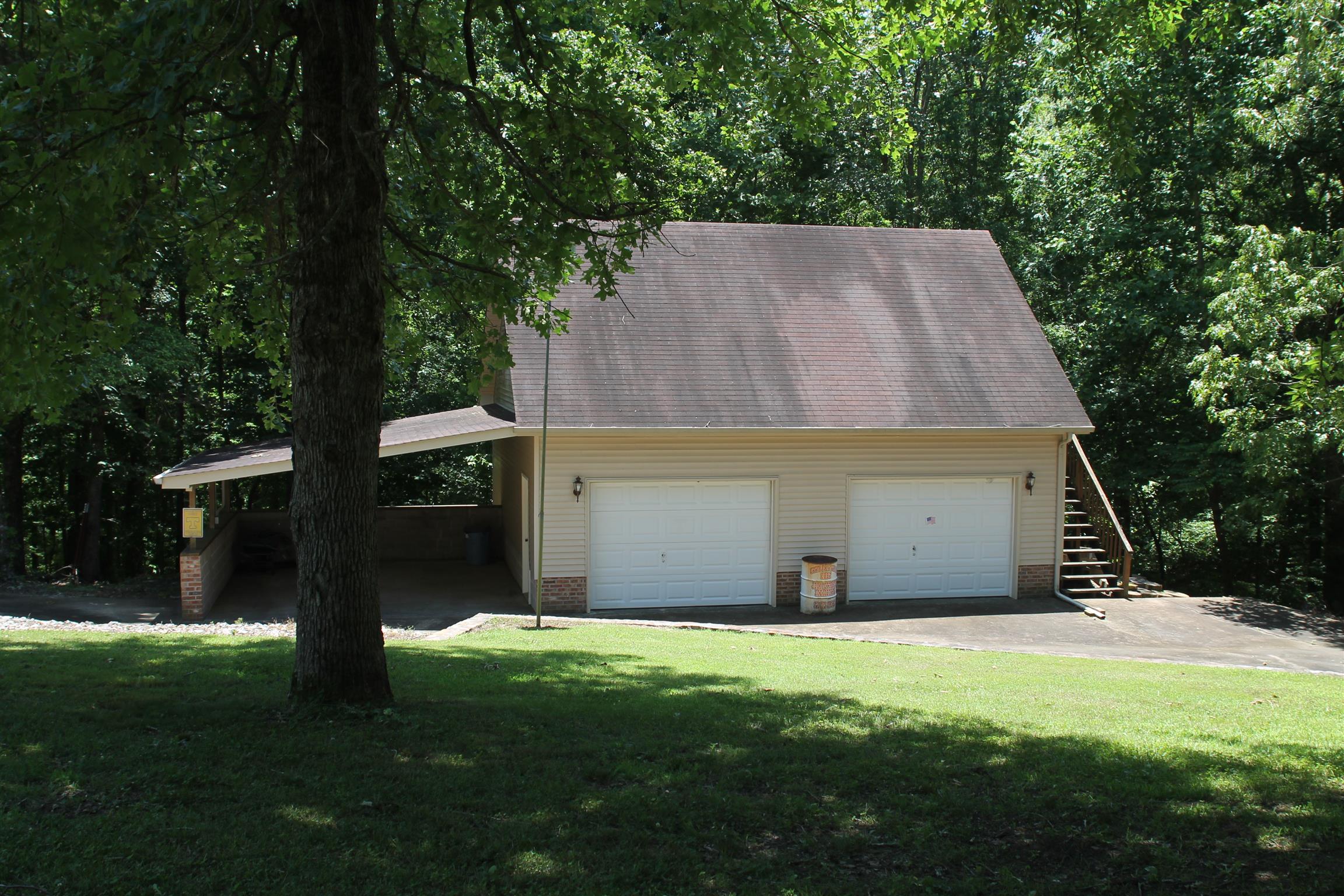 485 Metal Ford Road Hohenwald, TN 38462 - Photo 5 of 20 Upstairs on Det Garage would make Great Apt - Outside Stairs Leading Up