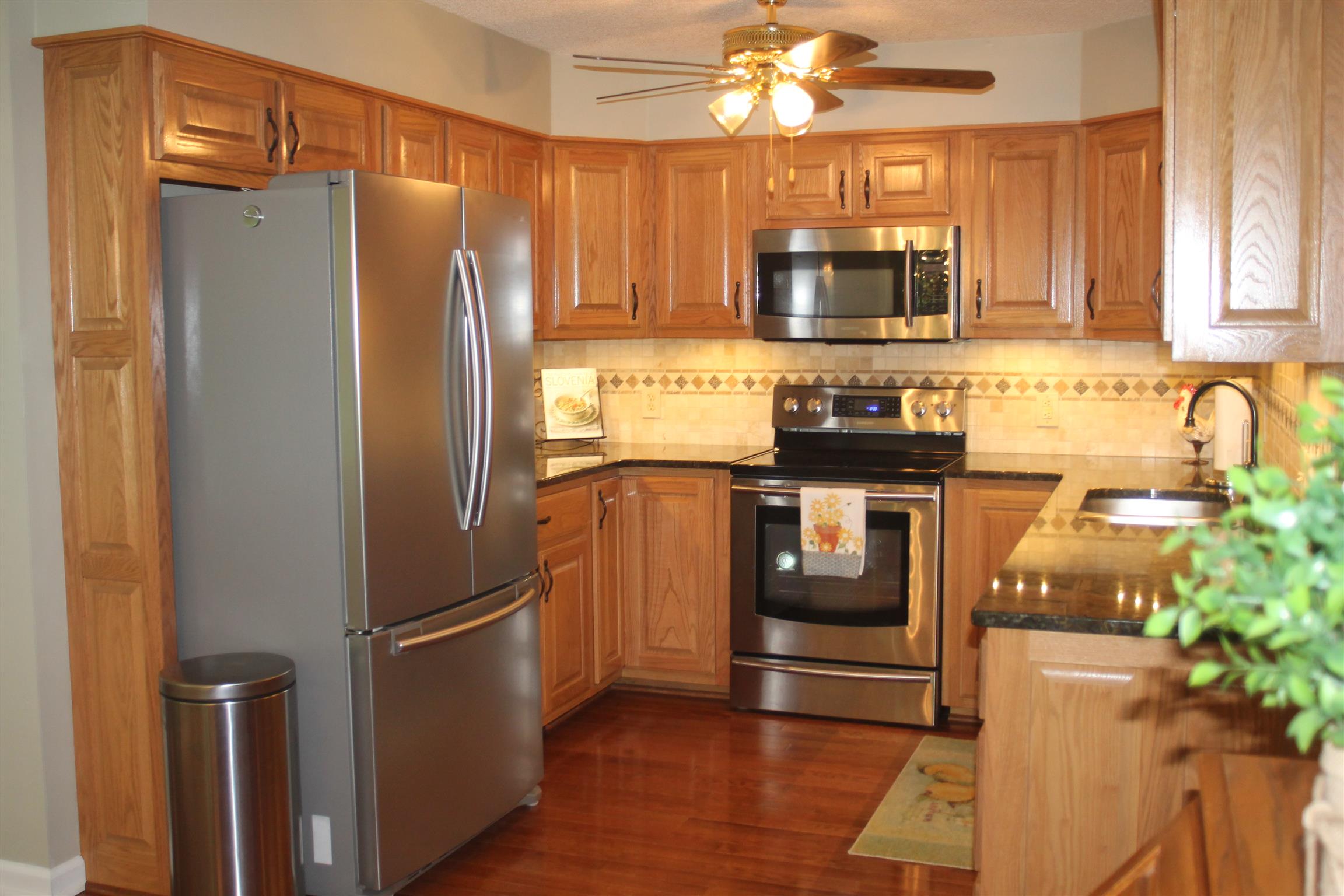 485 Metal Ford Road Hohenwald, TN 38462 - Photo 9 of 20 Completely New Kitchen with All New Appl, Granite, Hardwood Floors, Tile Backsplash