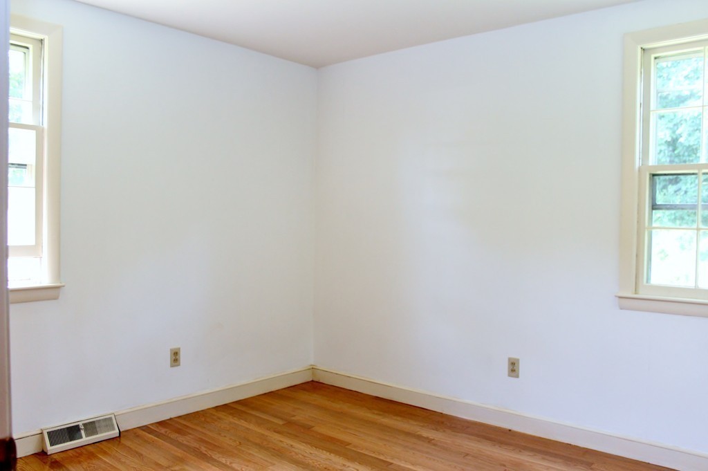 49 Rockland Street Hingham, MA 02043 - Photo 14 of 28 an empty room with a window