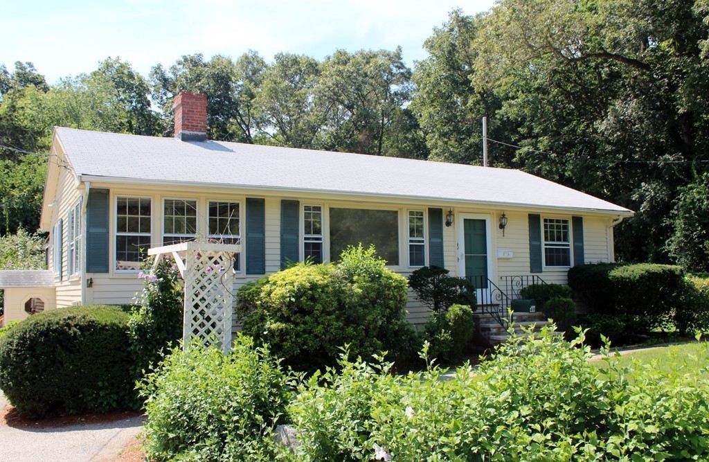 49 Rockland Street Hingham, MA 02043 - Photo 17 of 28 a view of a house with sitting area and garden
