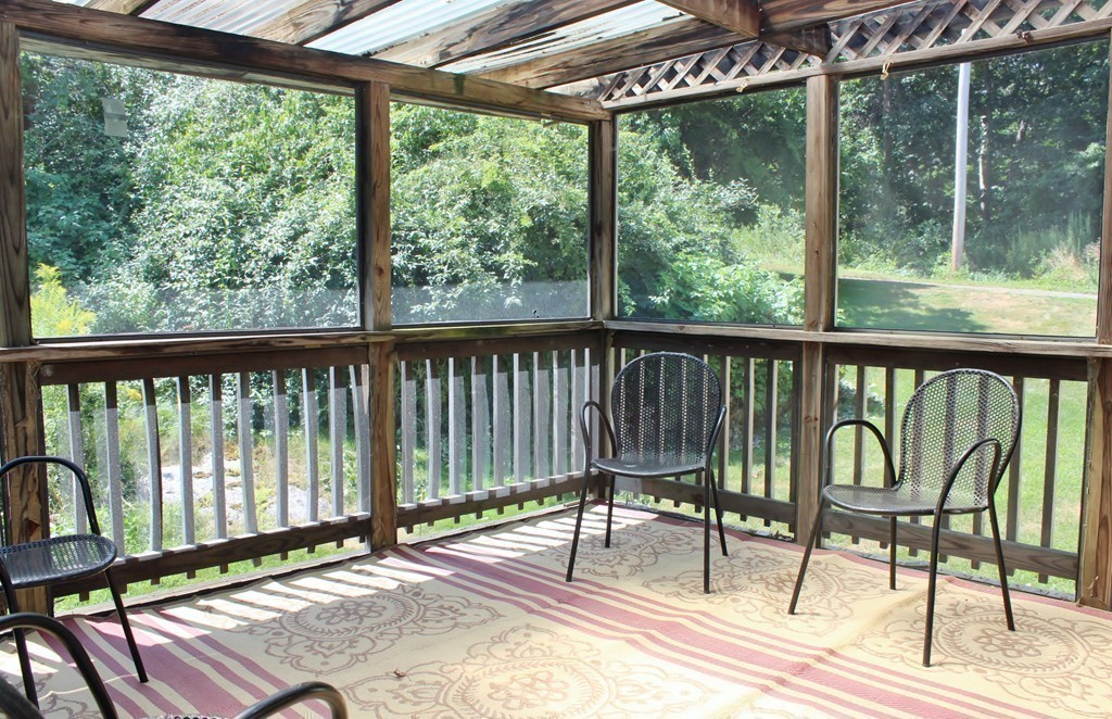 49 Rockland Street Hingham, MA 02043 - Photo 20 of 28 a view of a chairs on the roof deck