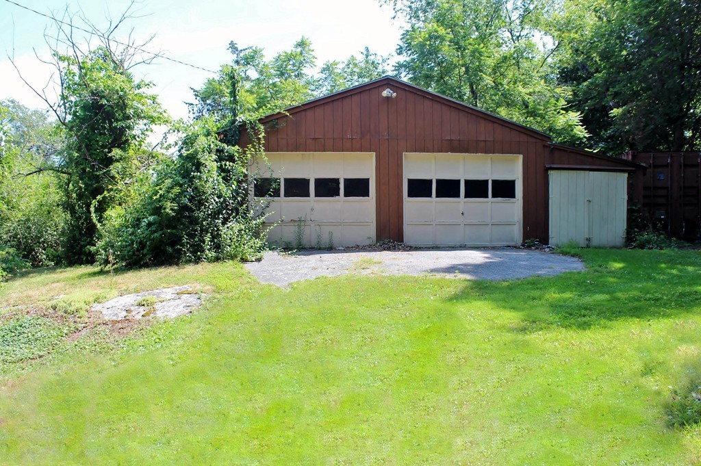 49 Rockland Street Hingham, MA 02043 - Photo 3 of 28 a house with swimming pool in front of it