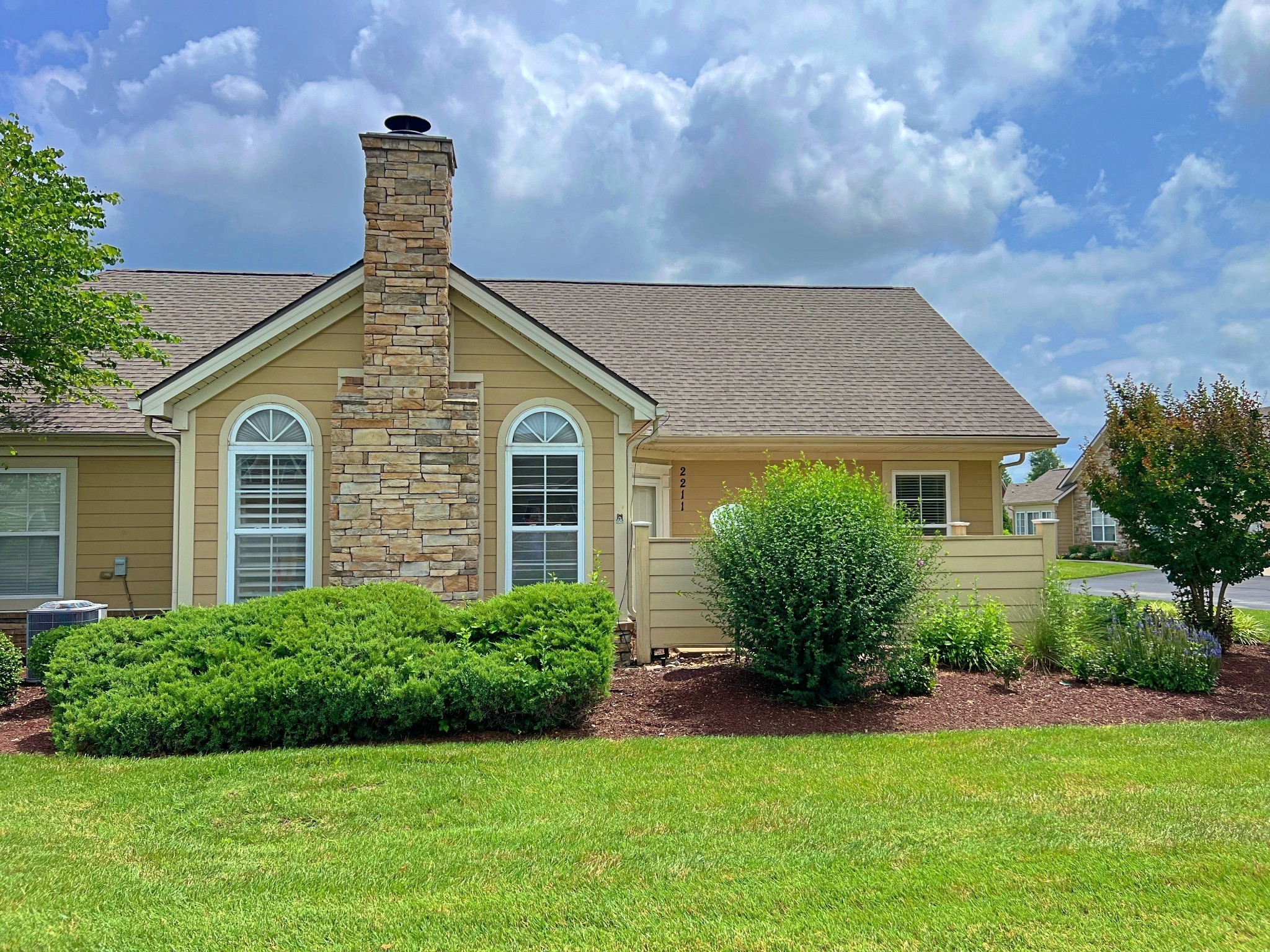2211 Bridgeway Street Murfreesboro, TN 37128 - Photo 29 of 32 a front view of a house with a garden