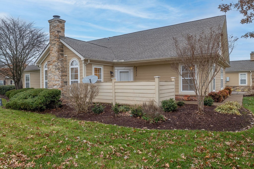 2211 Bridgeway Street Murfreesboro, TN 37128 - Photo 4 of 32 a front view of a house with garden