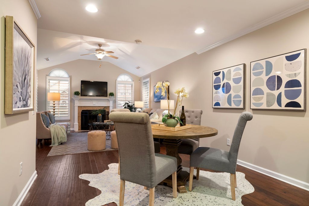 2211 Bridgeway Street Murfreesboro, TN 37128 - Photo 6 of 32 a view of a dining room with furniture a chandelier and wooden floor