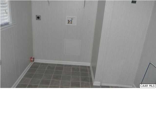 228 Knights Road Buckingham, VA 23921 - Photo 12 of 12 a black and white photo of a room