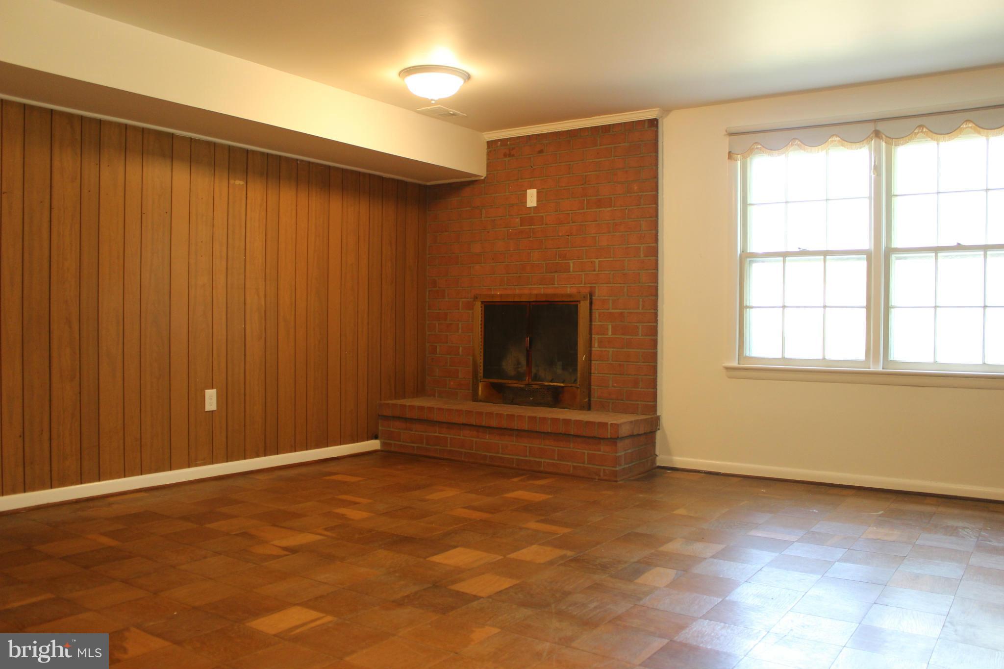 210 Randolph Road Silver Spring, MD 20904 - Photo 17 of 29 Spacious Family Room w/Wood Burning Fireplace