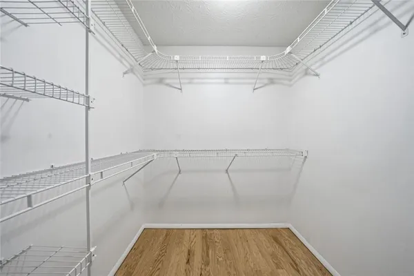 a view of a room with racks on the wall