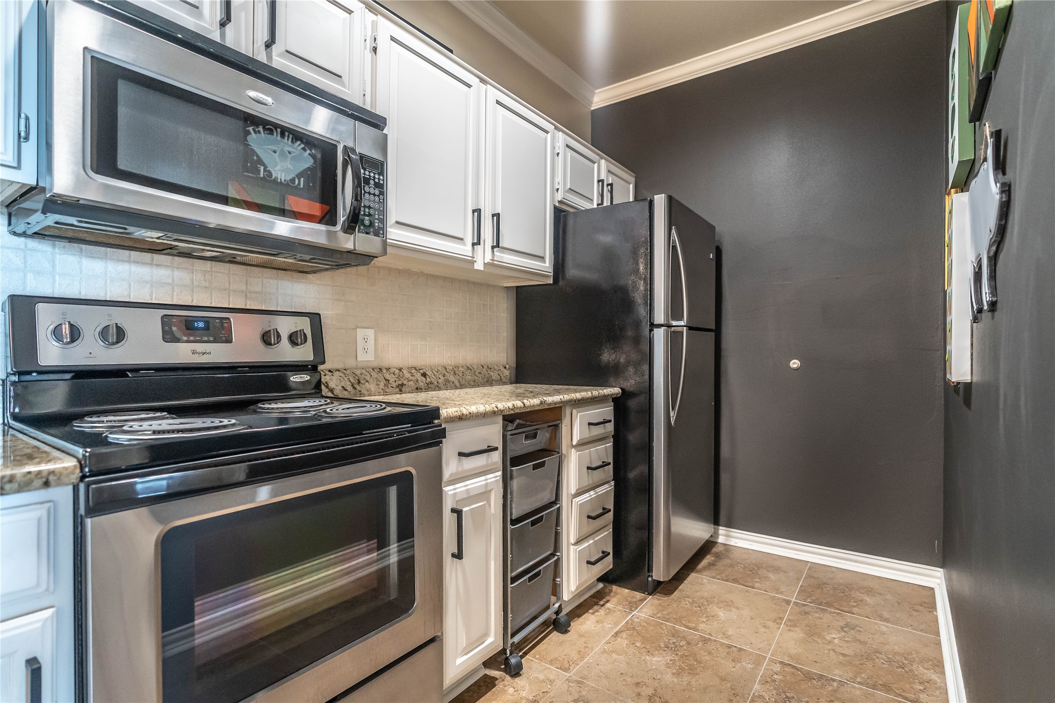 2111 Welch Street, Unit A232 Houston, TX 77019 - Photo 12 of 22 Sleek stainless-steel appliances.