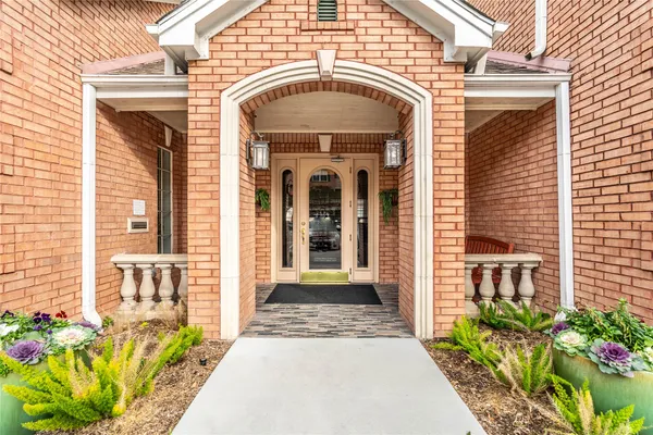 a front view of a house with a pathway