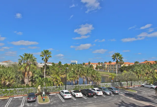 a view of a terrace with a table and chairs