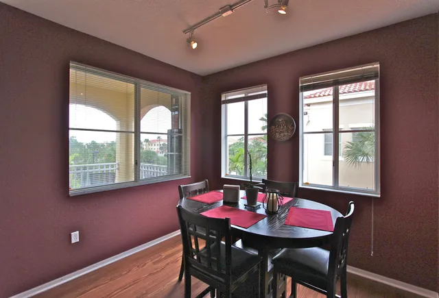 a view of a dining room with furniture window and outside view