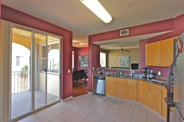 a large bathroom with a large tub and sink