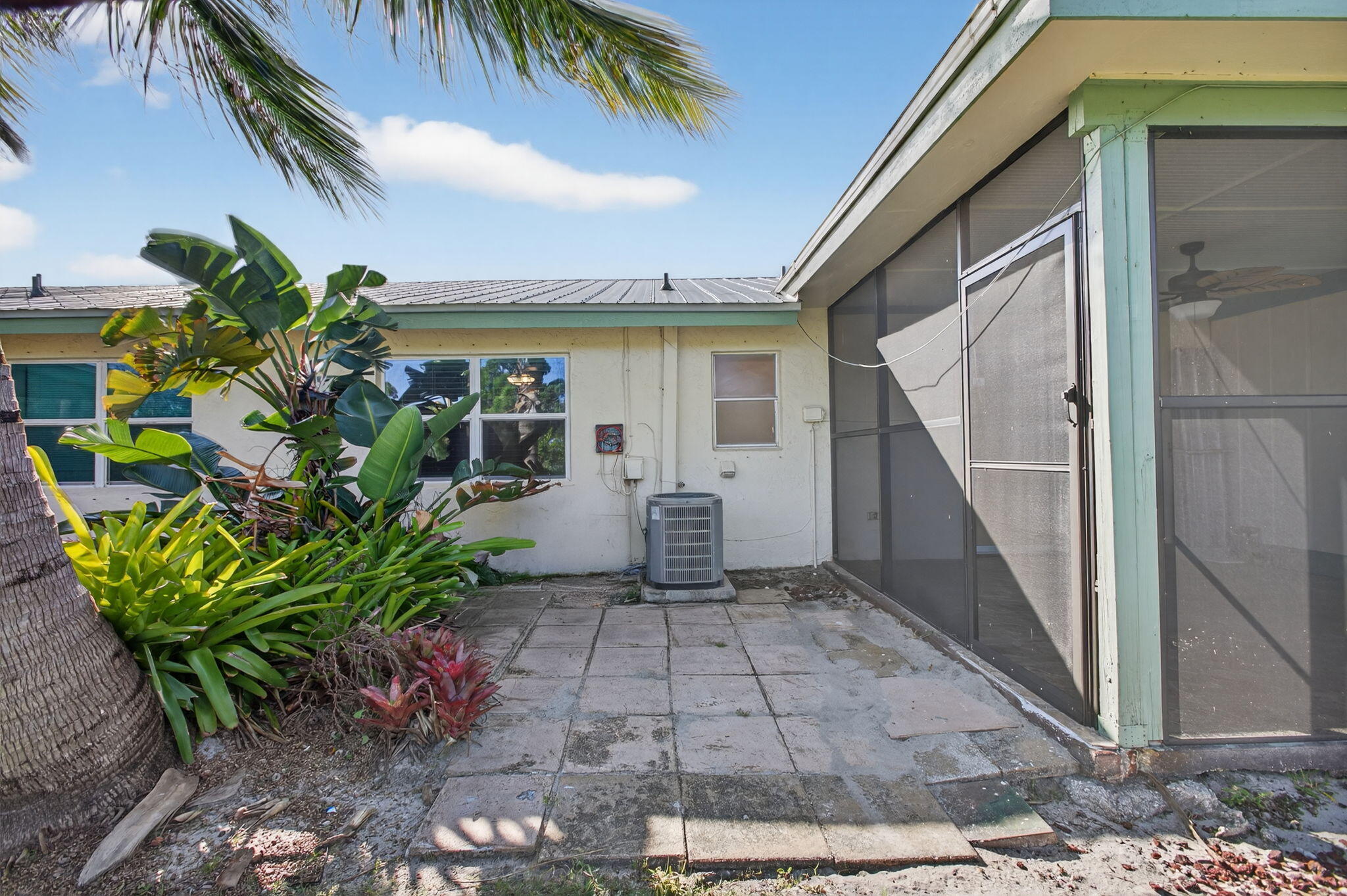 8695 Southeast Hobe Ridge Avenue Hobe Sound, FL 33455 - Photo 28 of 29 a view of a back yard of the house