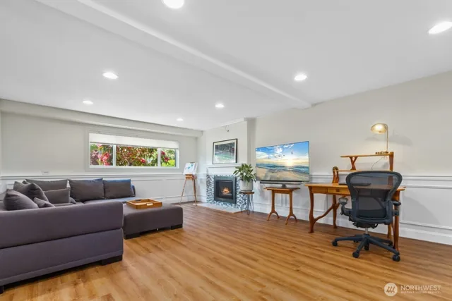a living room with a couch and a fireplace