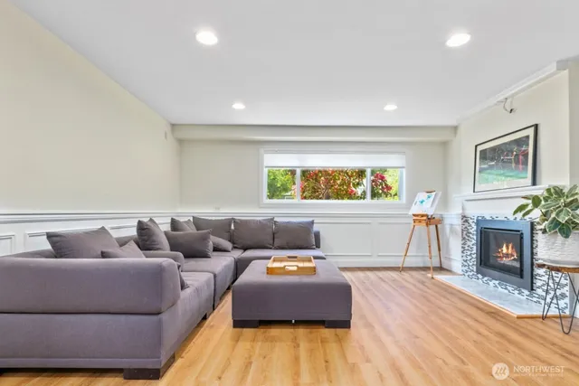 a workspace with wooden floor and a chair