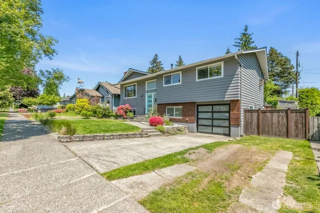 a view of house with outdoor space and entertaining space