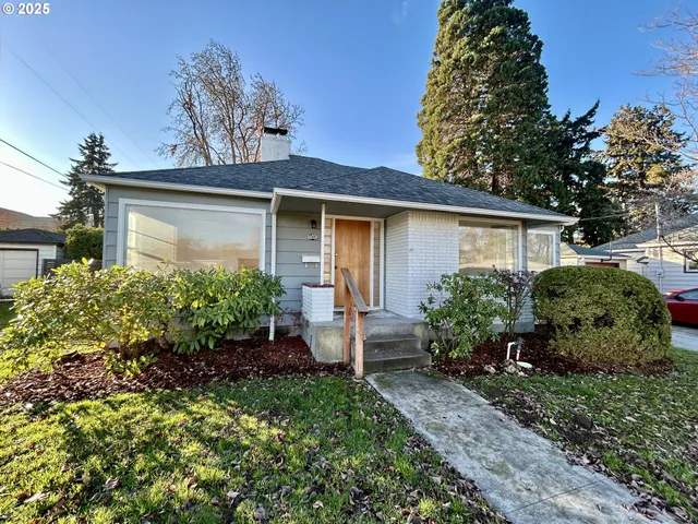a view of a house with garden