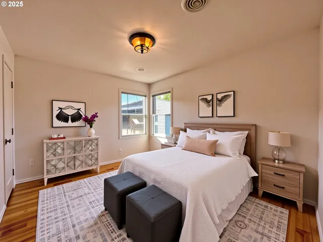 a bedroom with a bed and dresser