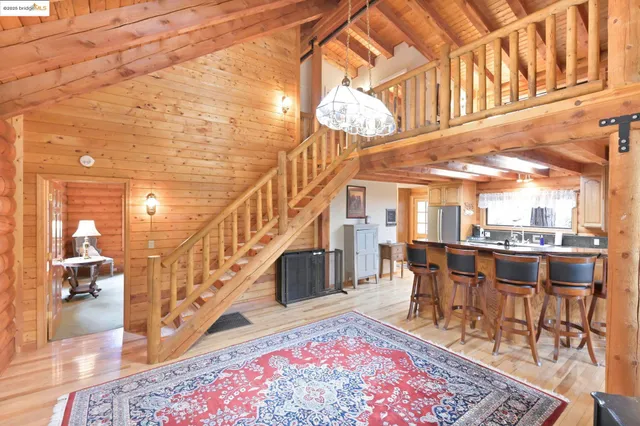 a outdoor space with lots of furniture and wooden floor