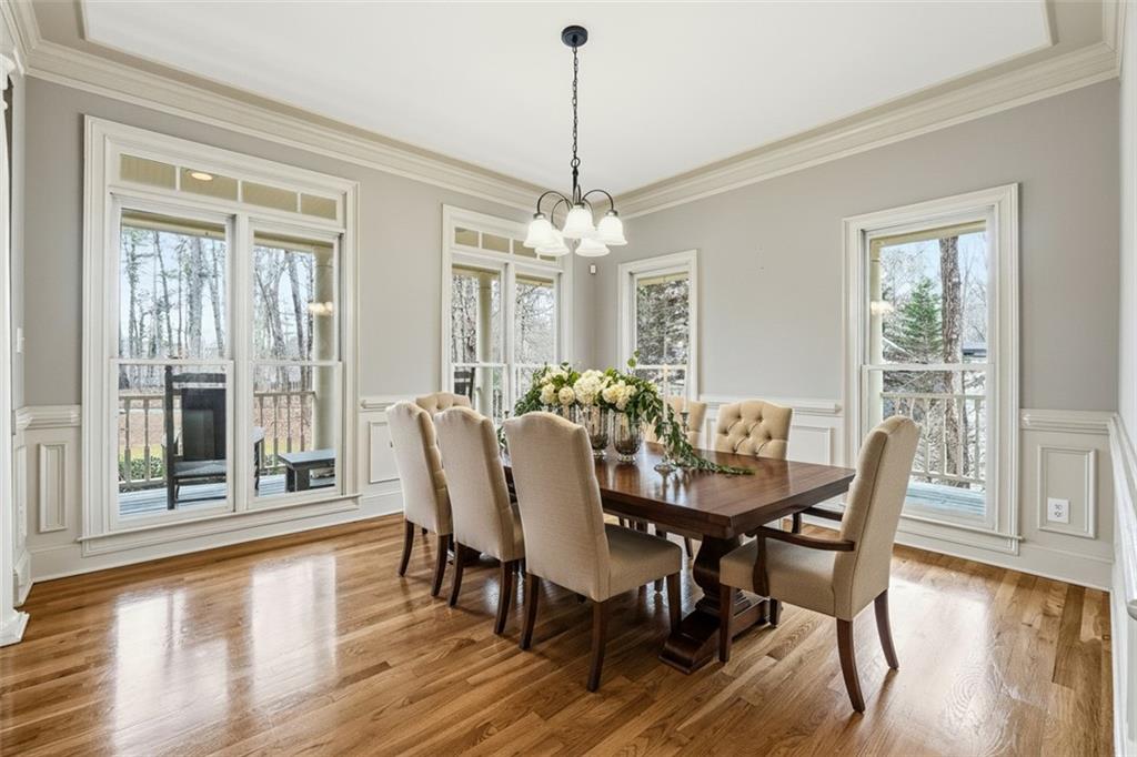 68 Old Mountain Road Northwest Powder Springs, GA 30127 - Photo 4 of 18 a dining room with furniture window wooden floor