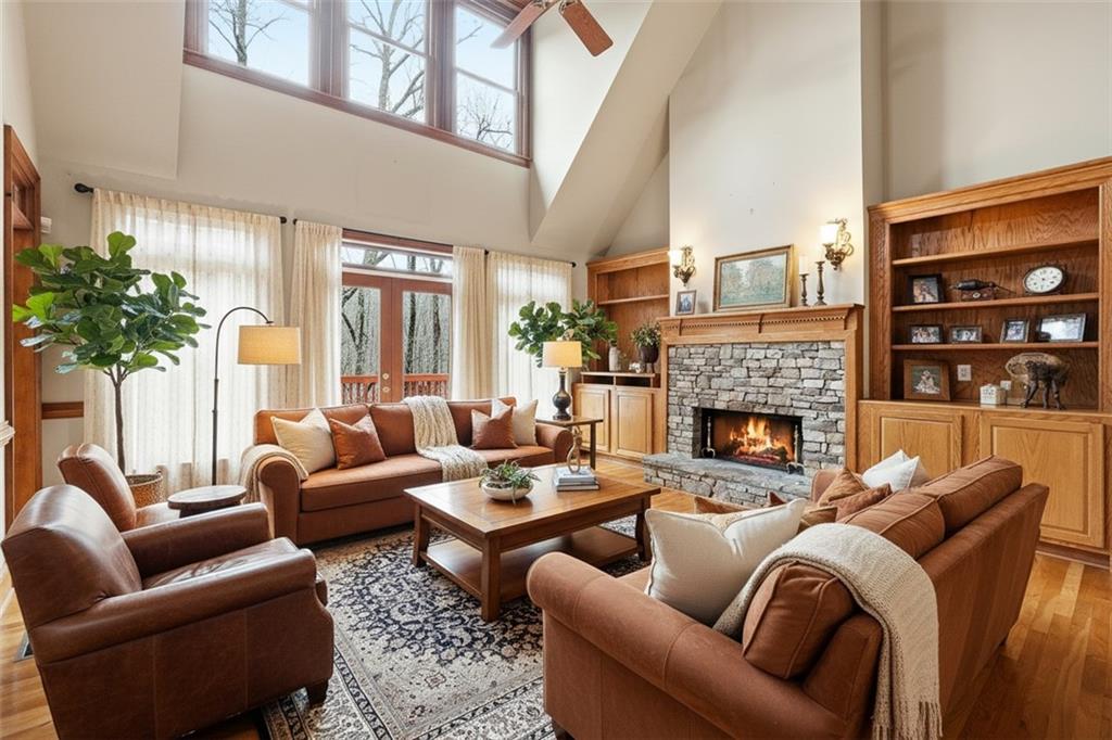 68 Old Mountain Road Northwest Powder Springs, GA 30127 - Photo 5 of 18 a living room with furniture fireplace and a large window