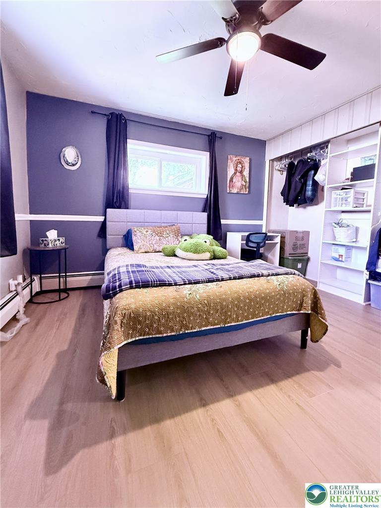 1275 Macada Road Bethlehem, PA 18017 - Photo 56 of 87 A well-lit bedroom features durable laminate flooring and a convenient ceiling fan.