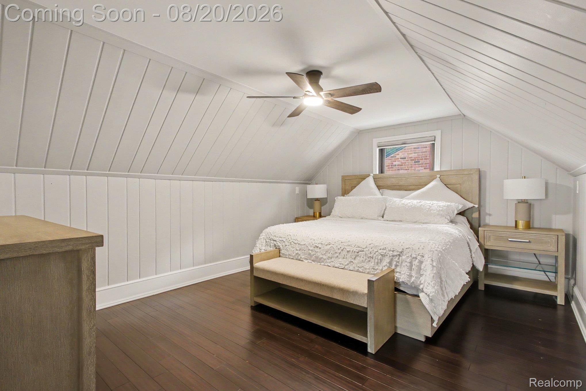 4098 Wakefield Road Berkley, MI 48072 - Photo 21 of 49 Vaulted ceiling with a ceiling fan, recessed window, dark wood-finish flooring, and white paneled walls