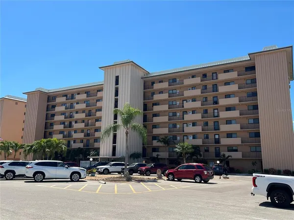 a cars parked in front of a building