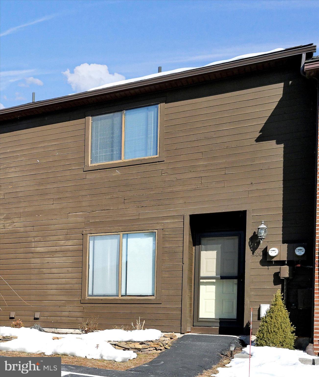 2604 Village Road Orwigsburg, PA 17961 - Photo 2 of 24 a front view of a house with a garage