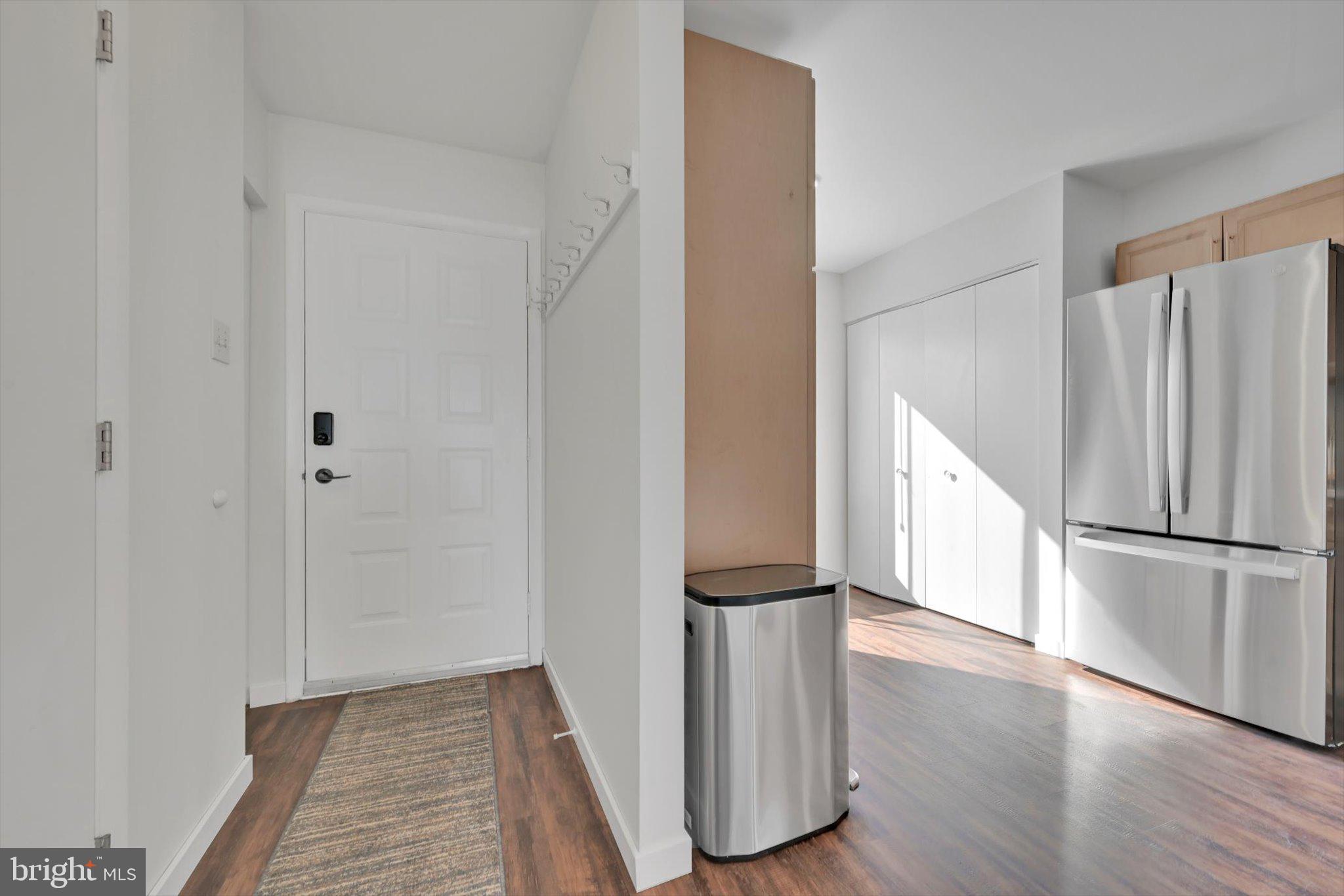 2604 Village Road Orwigsburg, PA 17961 - Photo 3 of 24 a view of a kitchen with wooden floors and electronic appliances