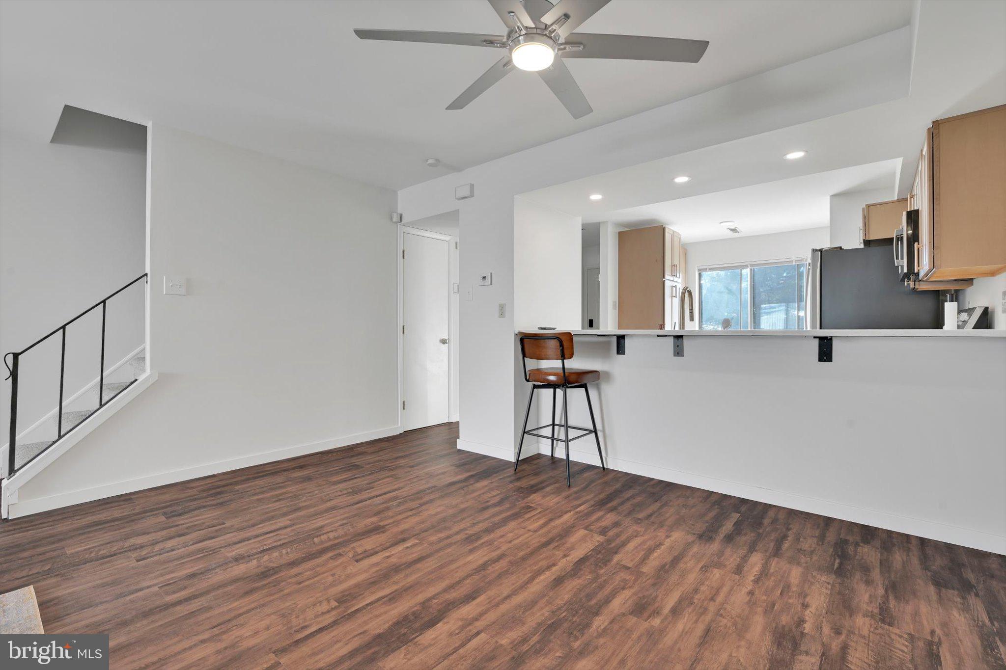 2604 Village Road Orwigsburg, PA 17961 - Photo 7 of 24 a view of a kitchen with furniture and wooden floor