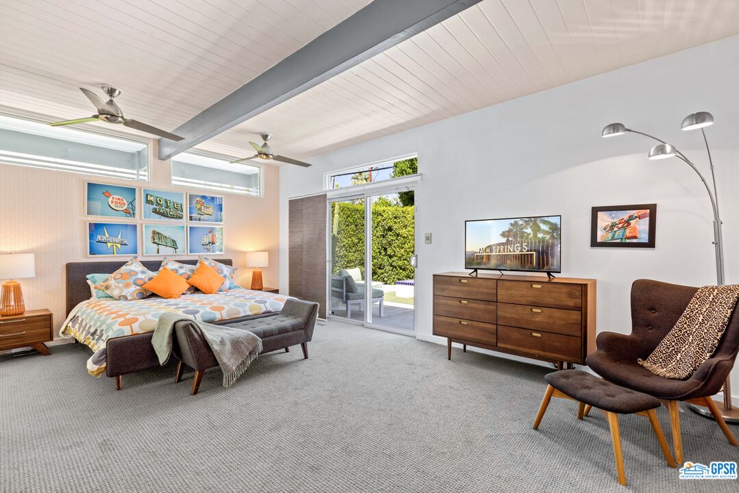 1008 Apache Road Palm Springs, CA 92264 - Photo 19 of 55 a bedroom with furniture and windows