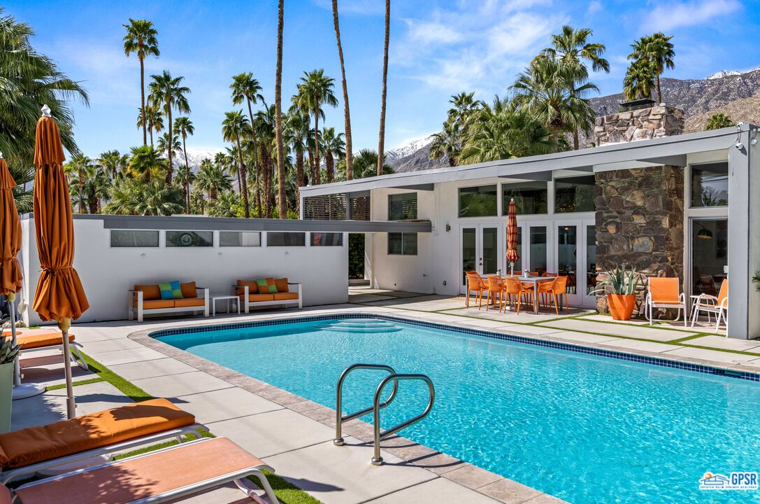 1008 Apache Road Palm Springs, CA 92264 - Photo 28 of 55 a view of a house with backyard porch and sitting area