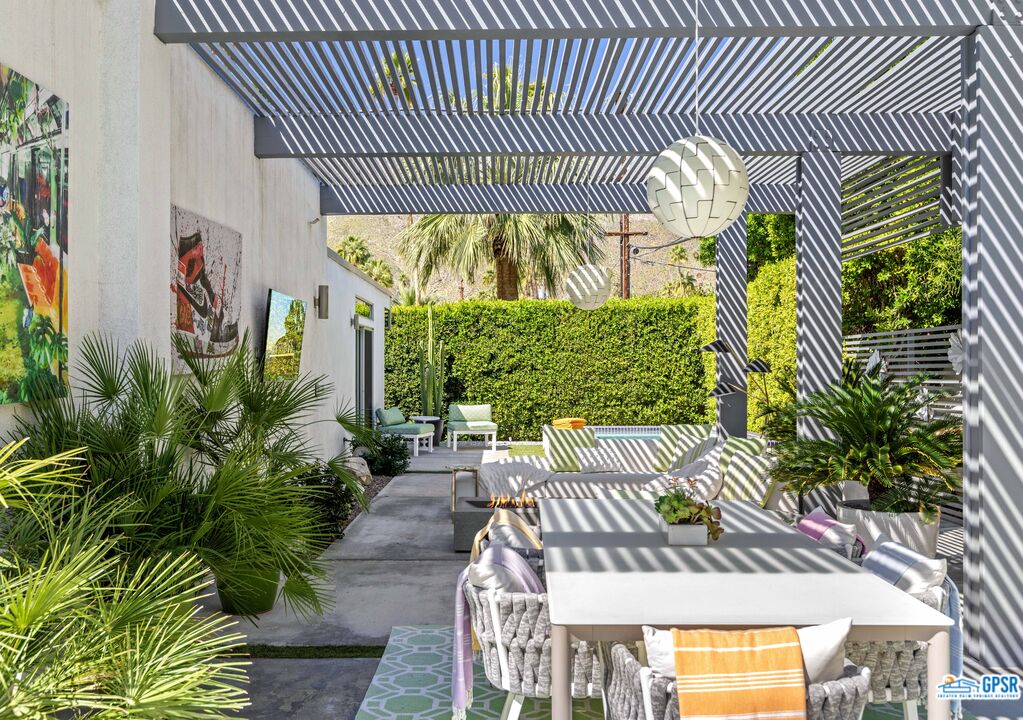 1008 Apache Road Palm Springs, CA 92264 - Photo 31 of 55 a view of an outdoor sitting area