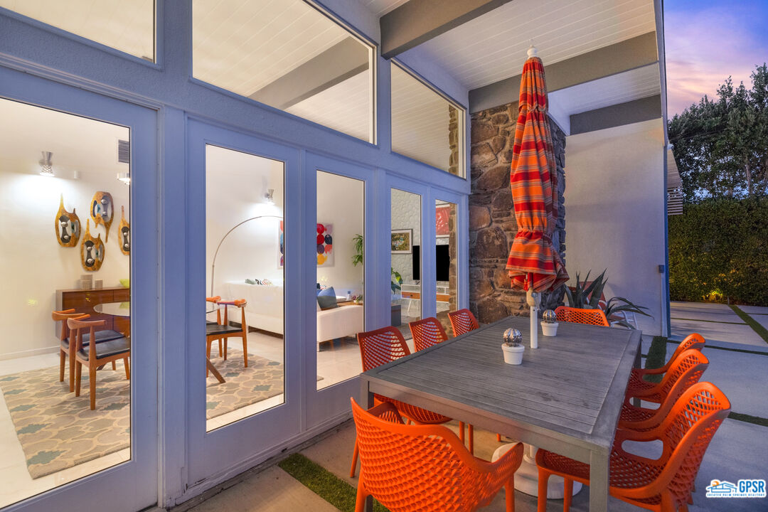 1008 Apache Road Palm Springs, CA 92264 - Photo 46 of 55 a view of a dining room with a table and chairs