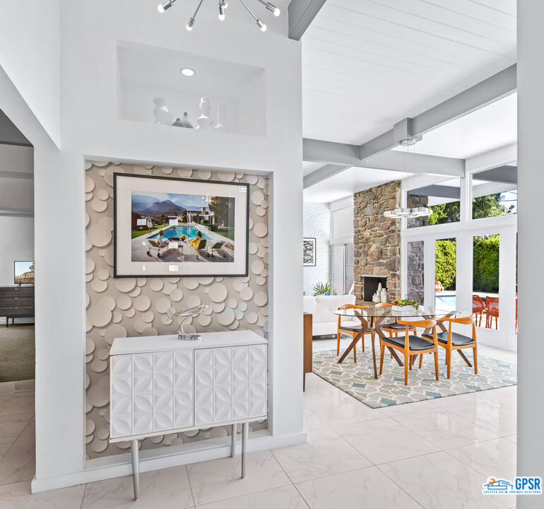 1008 Apache Road Palm Springs, CA 92264 - Photo 5 of 55 a living room with furniture and a large window
