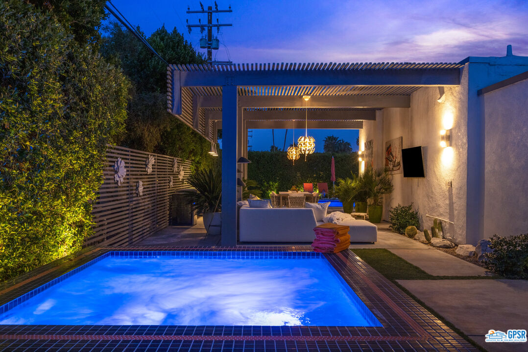 1008 Apache Road Palm Springs, CA 92264 - Photo 55 of 55 a view of swimming pool with outdoor seating