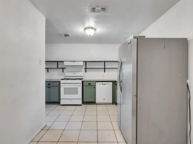 a utility room with washer and dryer