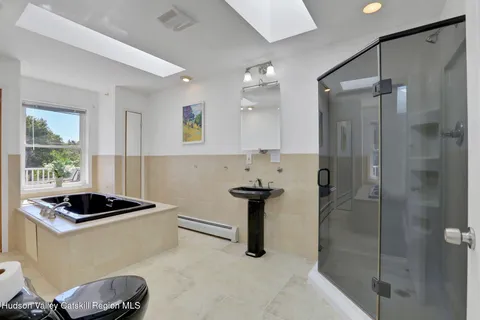 a kitchen with a refrigerator and a sink