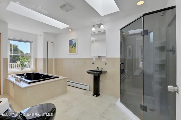 a kitchen with a refrigerator and a sink